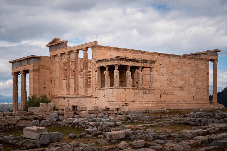 View of the ancient Erechtheion Temple with its iconic Caryatids, located at the Acropolis in Athens, Greece.